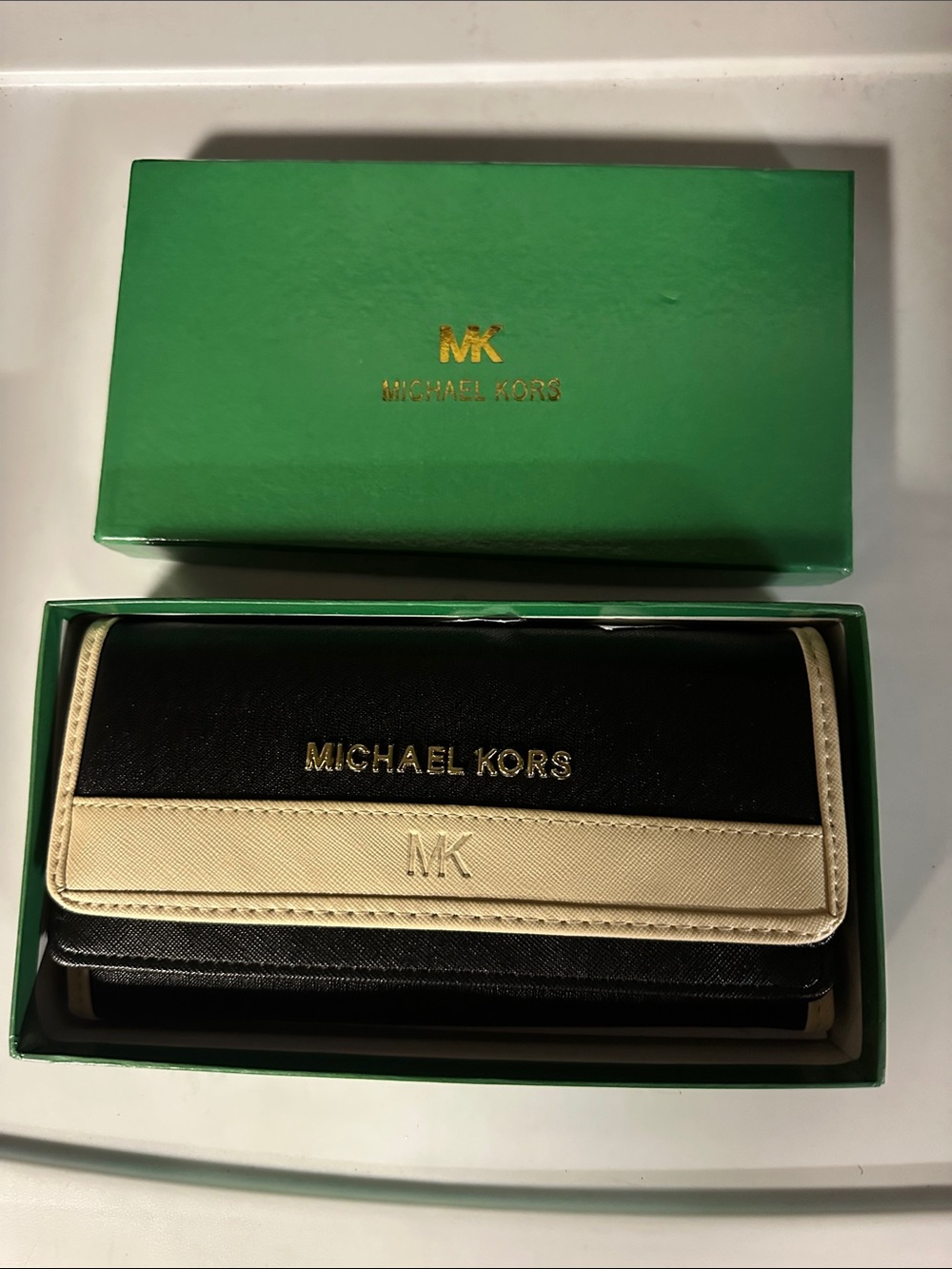 Michael Kors Black and Cream Continental Wallet with Gold Logo